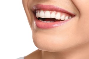 Close-up of a bright white smile showing healthy, whitened teeth and natural gum line.